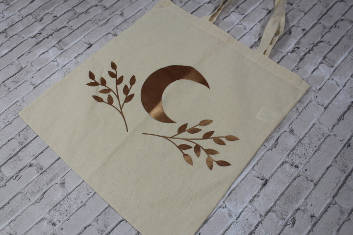moon and vine tote bag